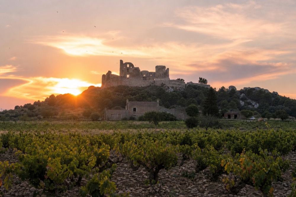 Sunset over Châteauneuf-du-Pape castle ruin, no text, no logos, no people