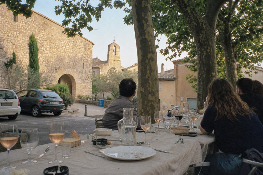 Lunch table at a Luberon village during a full-day wine tour, no text, no logos, no people